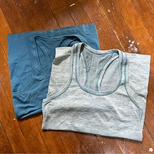 Pair of Lululemon Swiftly Tech Tanks